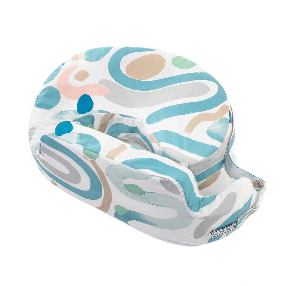 Colorful Nursing pillow with abstract pattern on a white background