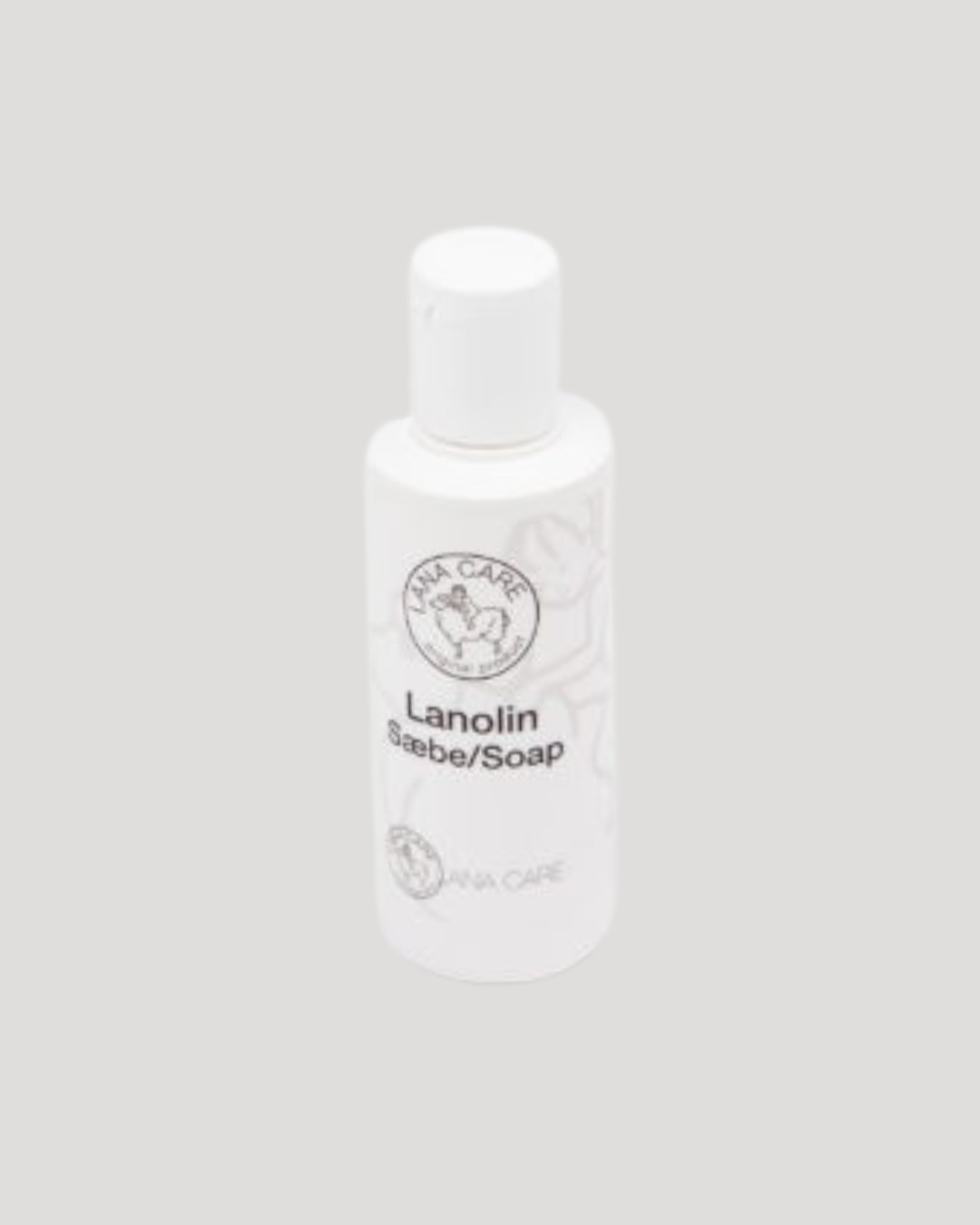 White bottle labeled 'Lanolin Soap' on a gray background