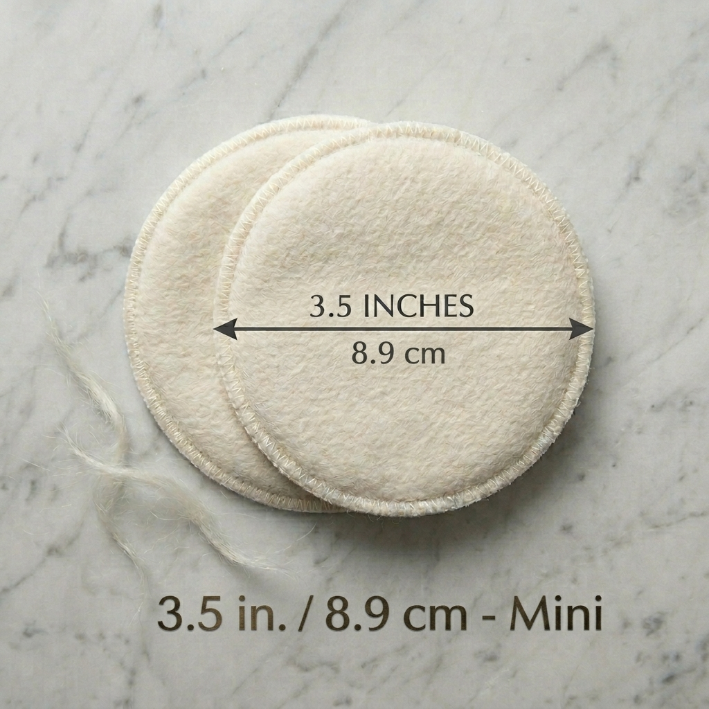 Two circular pads on a marble surface with measurement text
