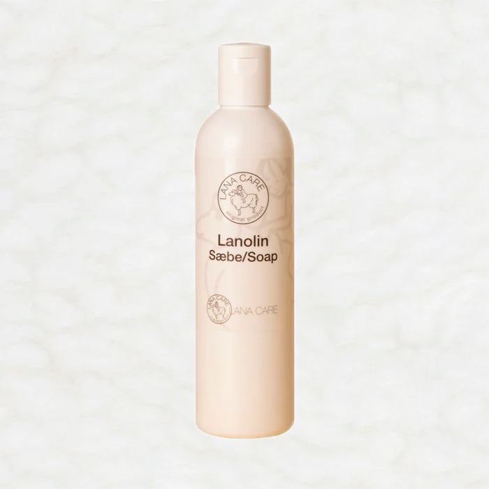 Beige bottle of Lanolin Säbe Soap on a light gray background