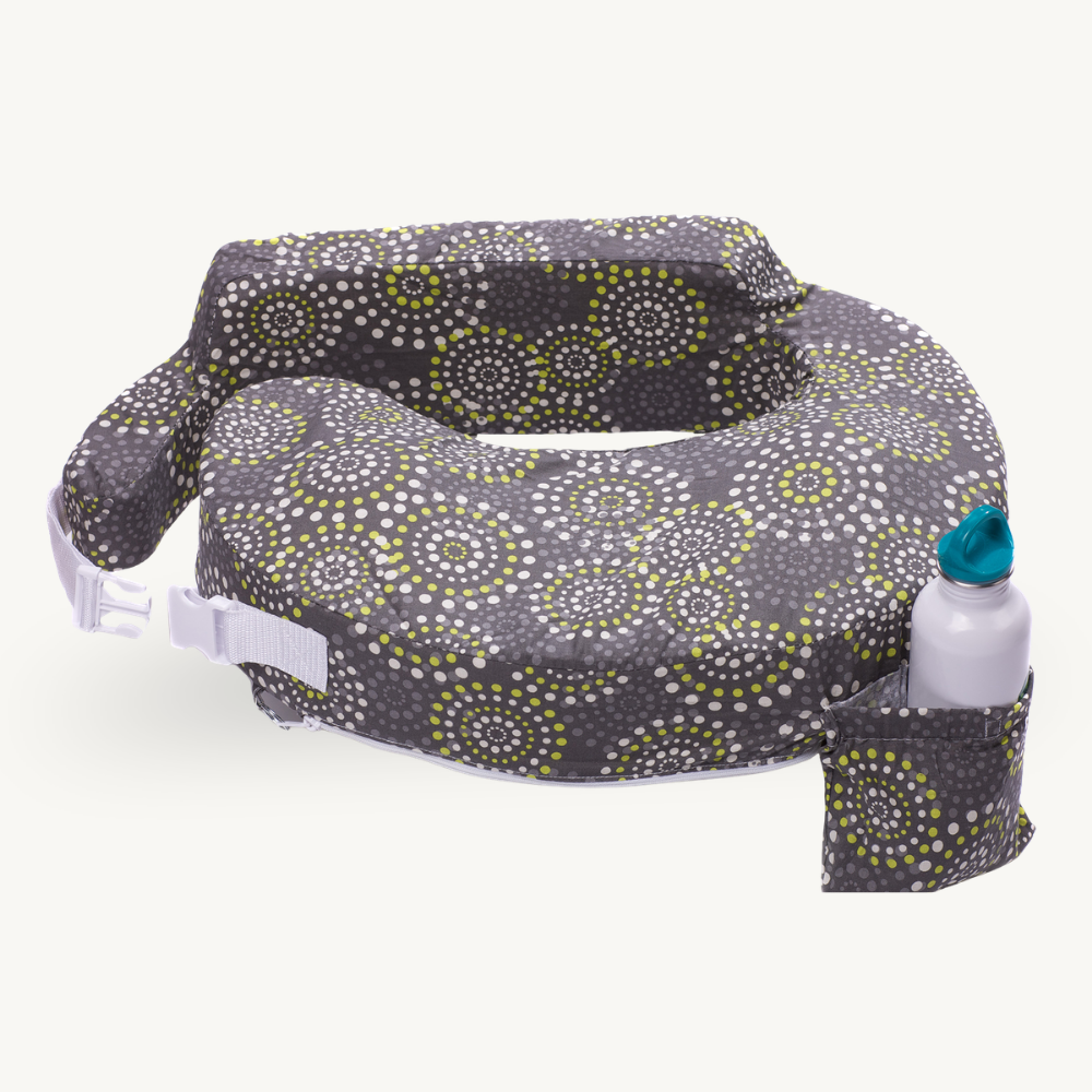 Gray patterned Nursing pillow with a water bottle on a white background