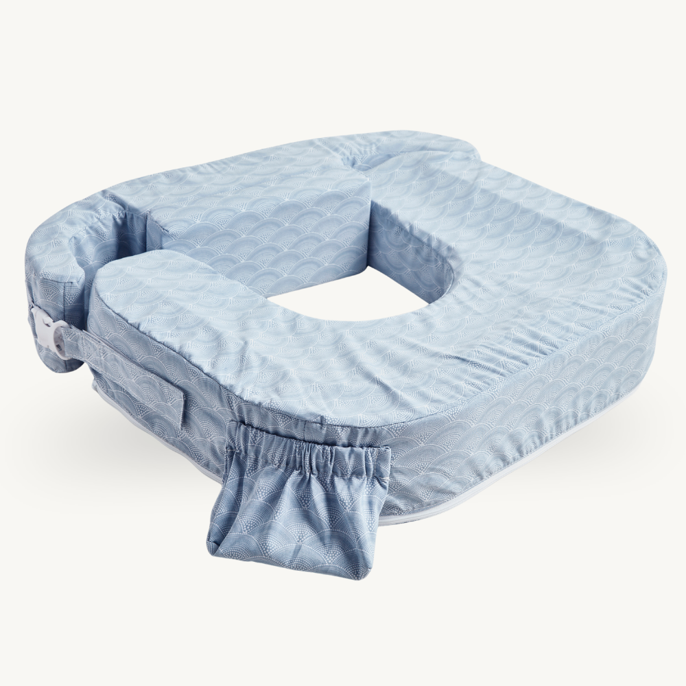 Blue Nursing pillow cover with a white background